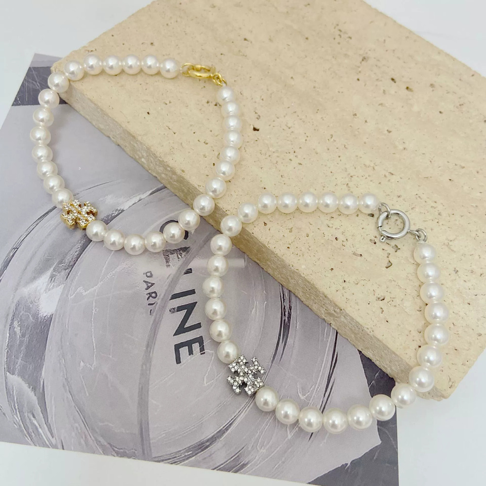 Tory Burch Pearl Letter Crystal Bracelet